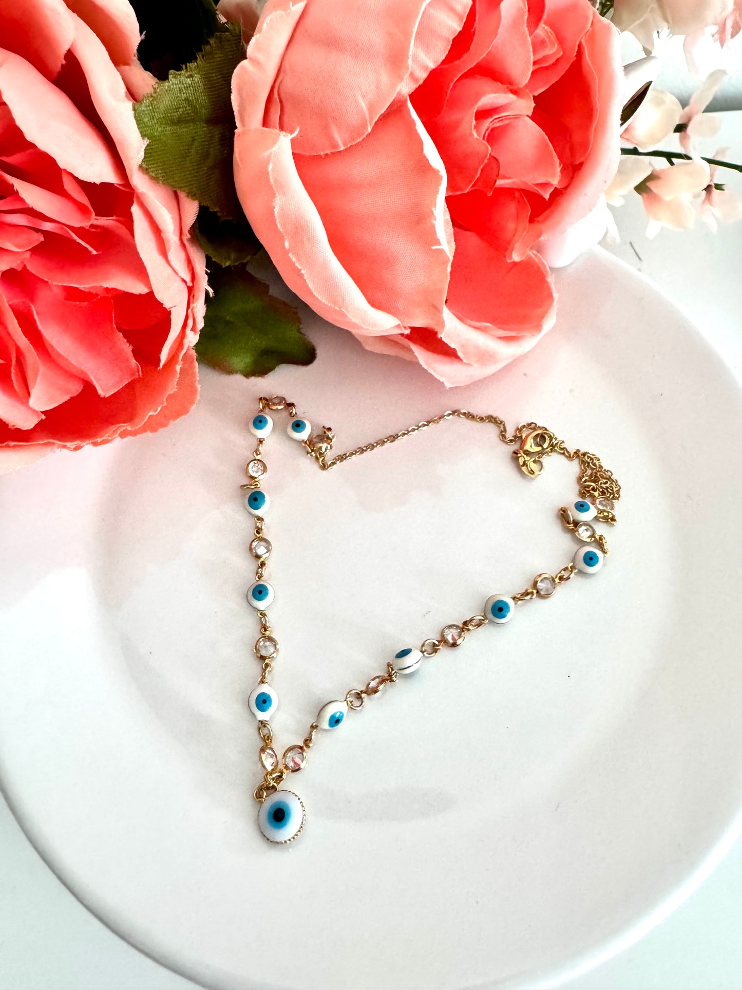 Collar con dije de ojo turco y colgantes de circonia – Bañado en oro de 18K o rodio