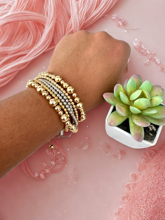 Pulsera ajustable con cuentas doradas 6mm – Bañada en oro de 18K