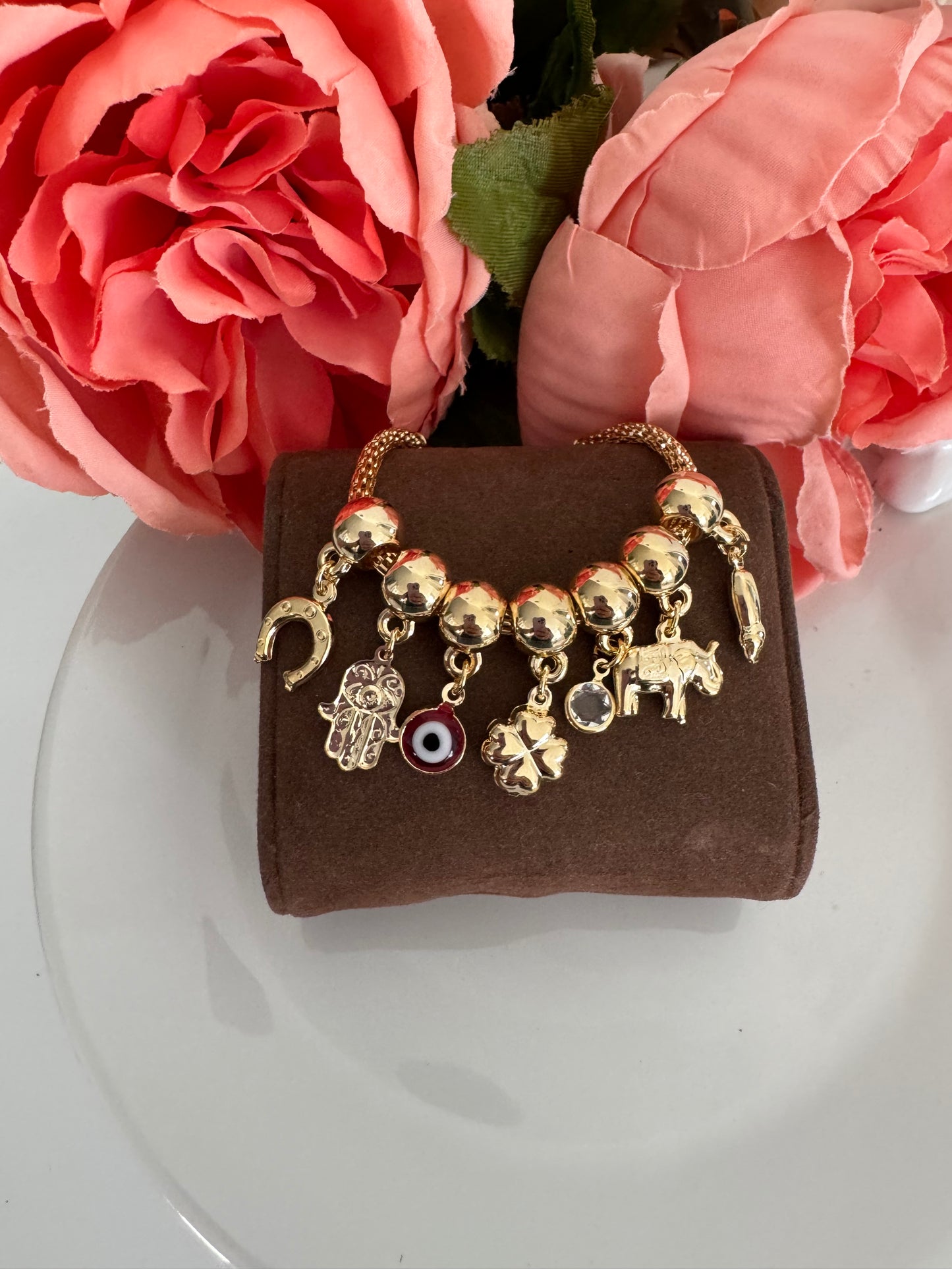 Pulsera con dijes de la suerte – Bañada en oro de 18K o rodio