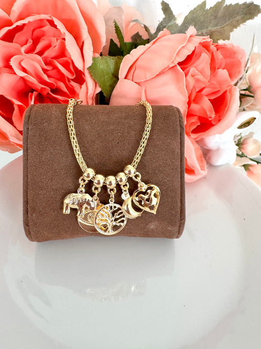 Pulsera de malla con dijes de la suerte – Bañada en oro de 18K