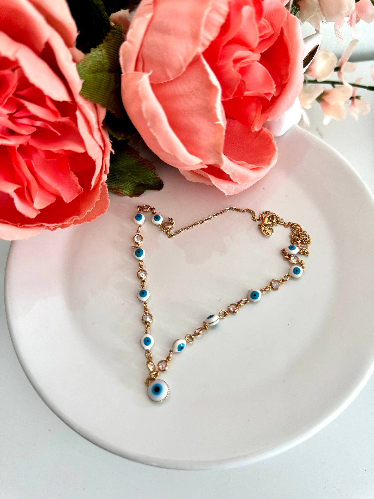 Collar con dije de ojo turco y colgantes de circonia – Bañado en oro de 18K o rodio