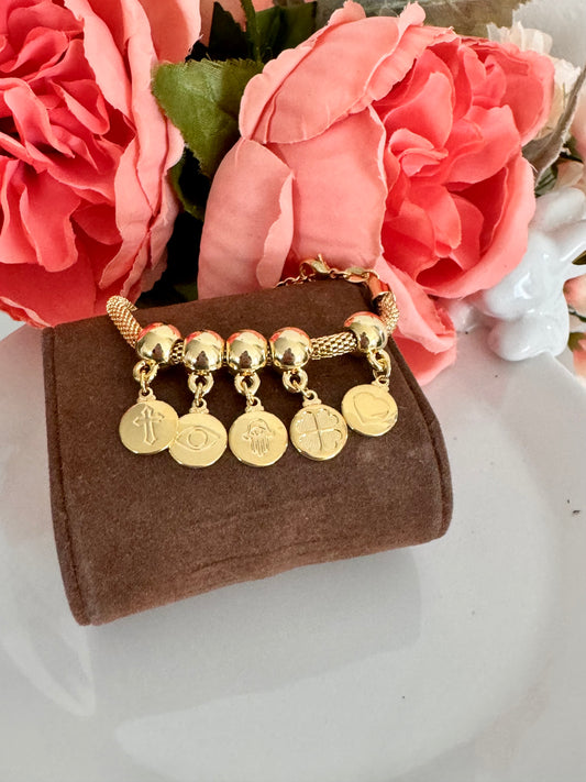 Pulsera con dijes de corazón, cruz, ojo turco y mano de Fátima – Bañada en oro de 18K